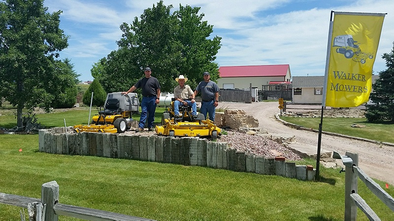 For the Jensen family—Josh, Howard and Chad Jensen (left to right)—the Walker Mower does more than stripe lawns and collect grass.