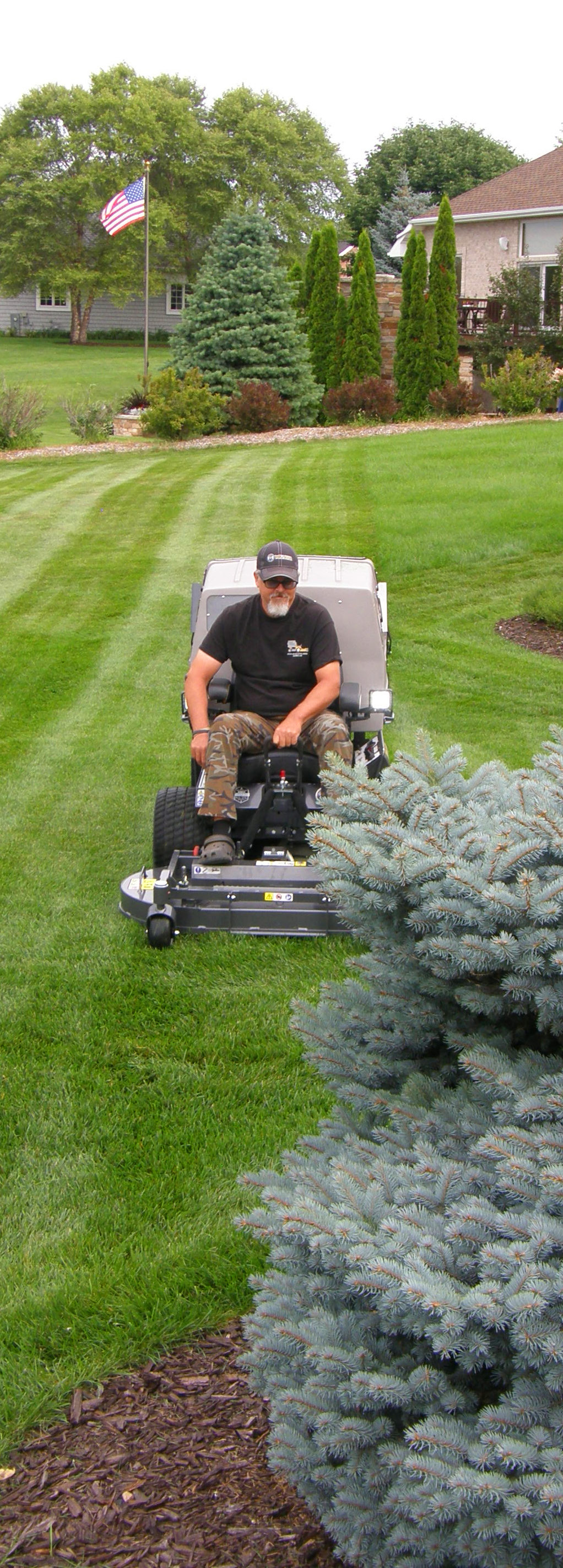 Rick Blosser mowing