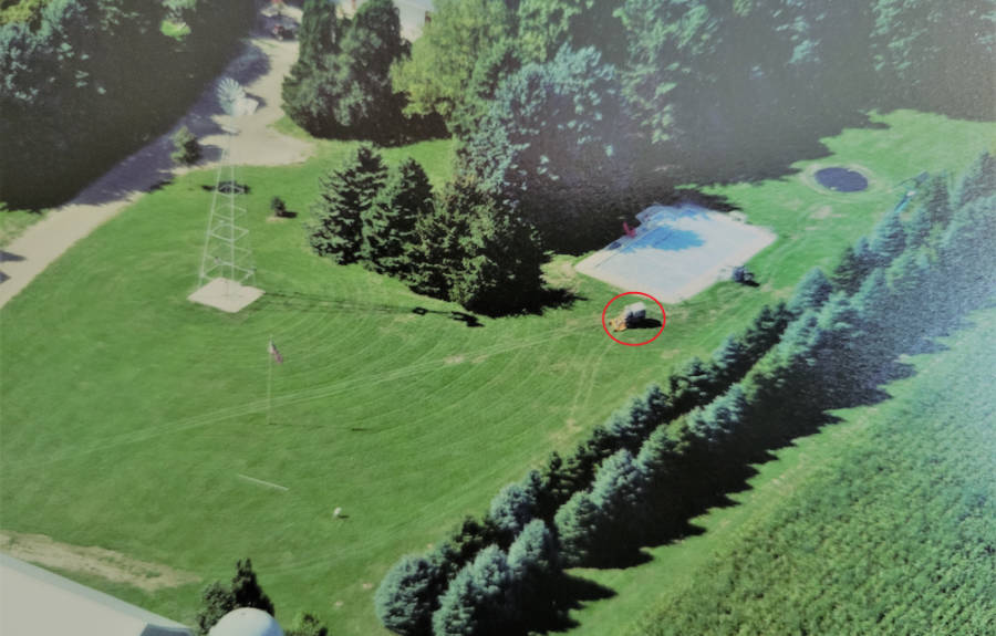 An aerial photographer snapped this shot of Dolly’s property many years ago. As luck would have it, Dolly was out on her Walker Mower at the time (red circle). But it wasn’t really luck. Dolly spent a lot of time on her Walker, earning her the nickname “lady on the lawn mower” around town.